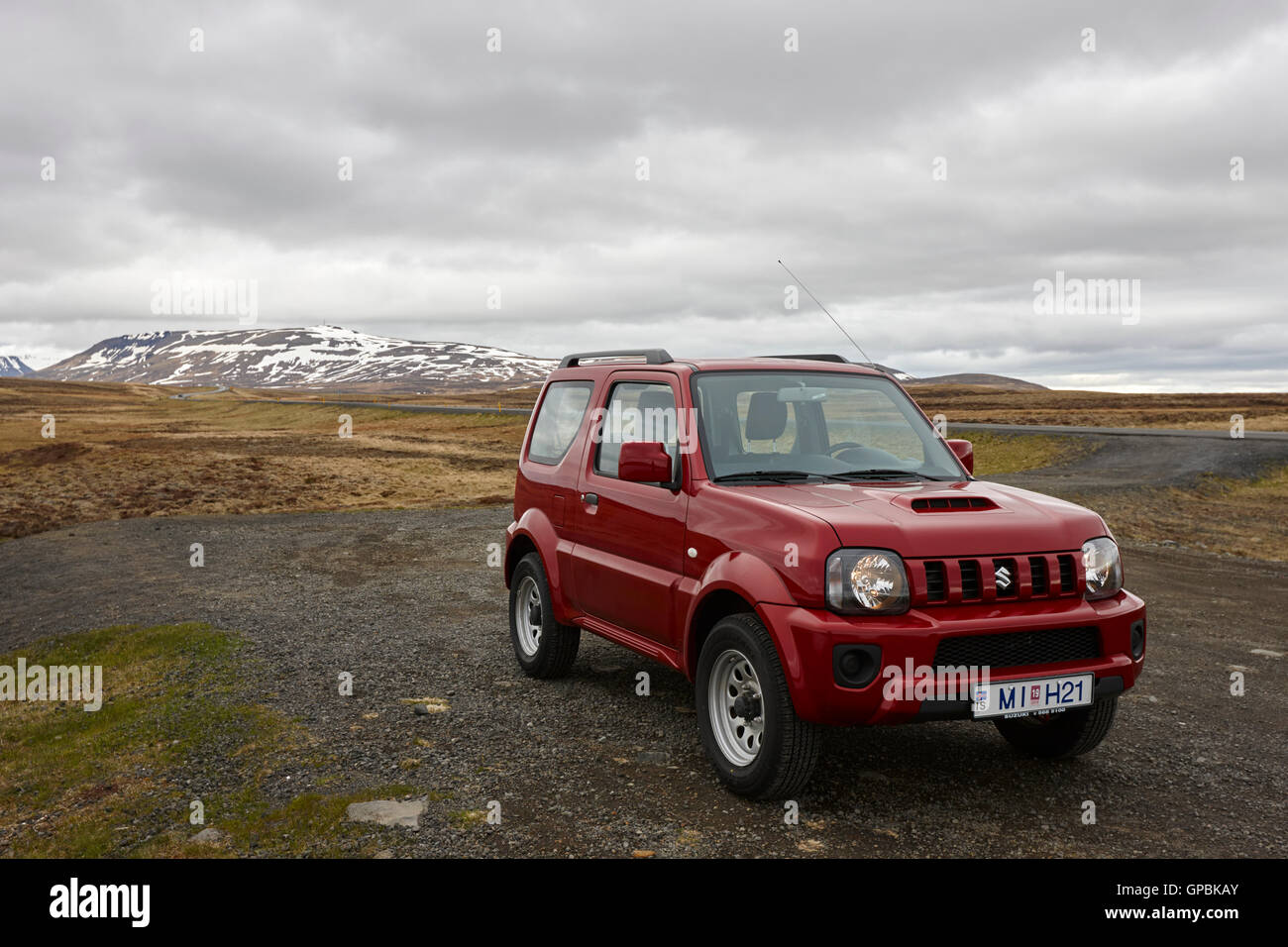Suzuki jimny 4x4 off road hire rental car in rural remote countryside driving in Iceland Stock Photo