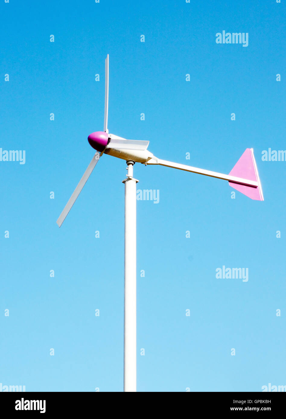 wind turbine on blue sky background Stock Photo - Alamy