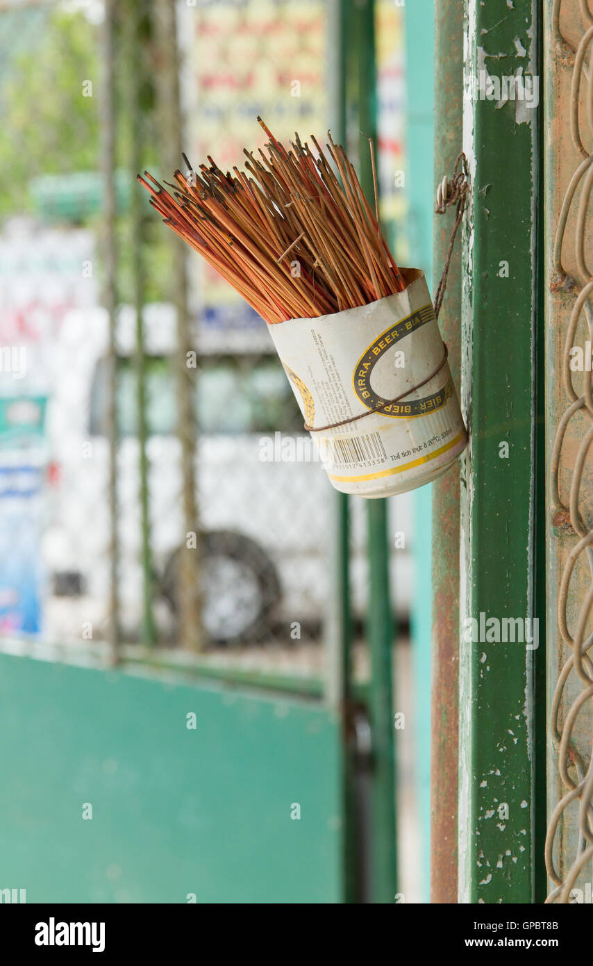 Incence sticks in an cut beer can Stock Photo Alamy