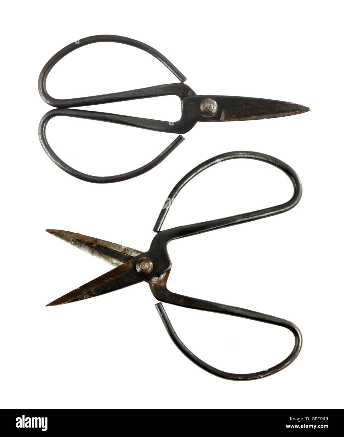 two old scissors on white background Stock Photo - Alamy