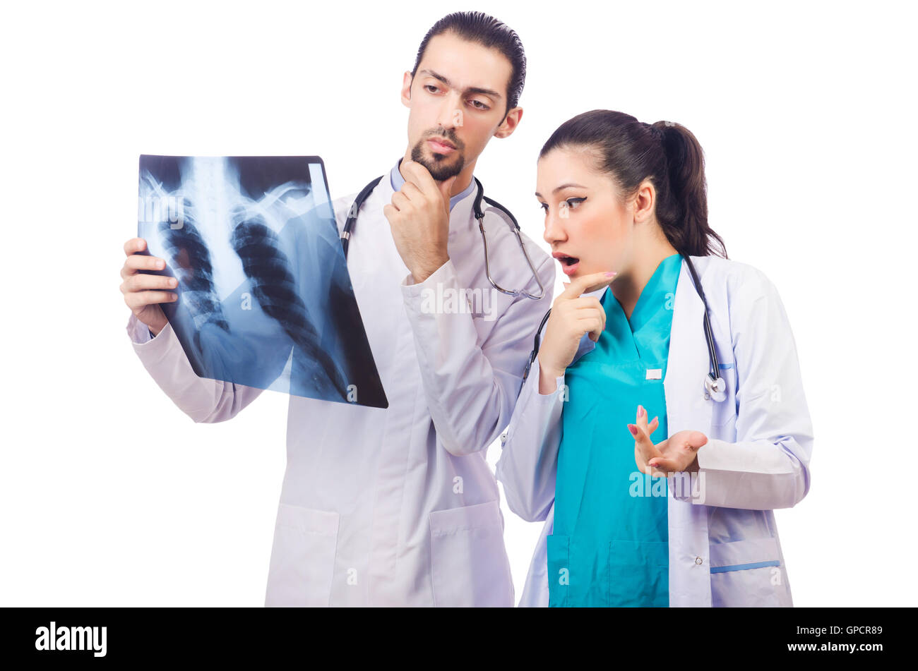 Two doctors looking at x-ray image on white Stock Photo - Alamy