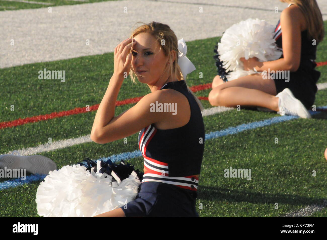 Cheer leaders at a sporting event at Robert Morris Stock Photo