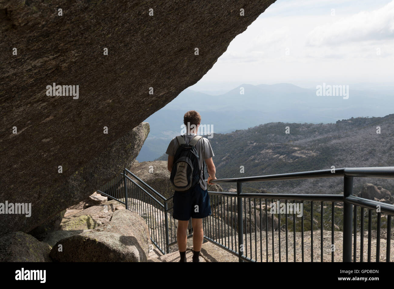 Man admiring the view on top of Mount Buffalo Stock Photo