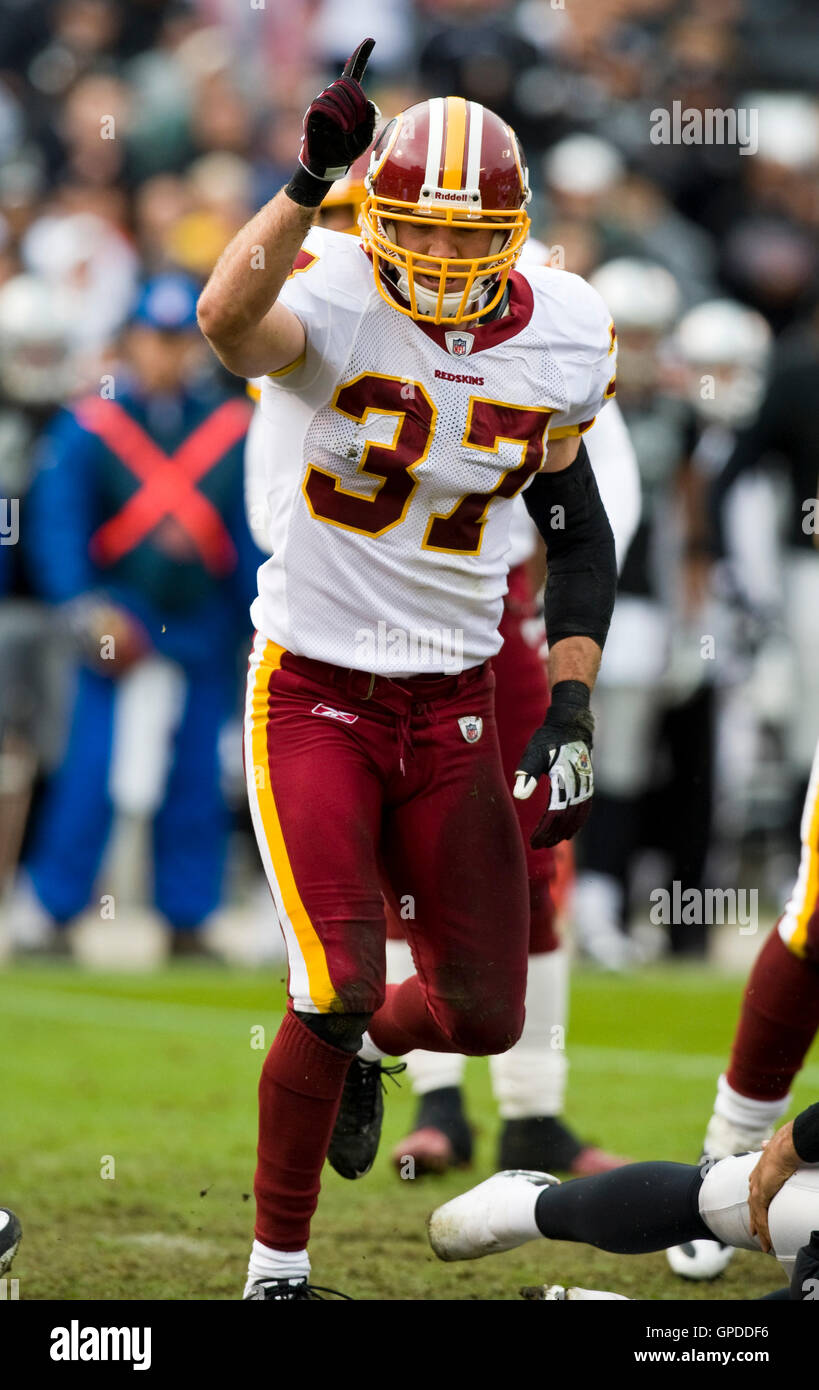 December 13, 2009; Oakland, CA, USA;  Washington Redskins safety Reed Doughty (37) celebrates after sacking Oakland Raiders quarterback Bruce Gradkowski (not pictured) during the first quarter at Oakland-Alameda County Coliseum.  Washington defeated Oakla Stock Photo