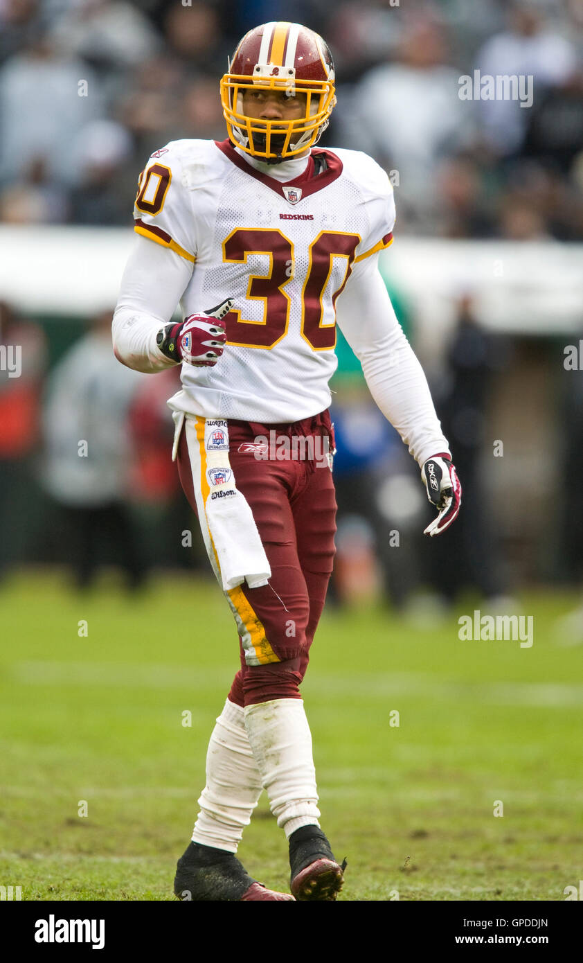 Oct. 10, 2010 - Landover, Maryland, United States of America - Washington  Redskins safety LaRon Landry (30) pass interception and run stopped by  Green Bay Packers wide receiver Donald Driver (80), week