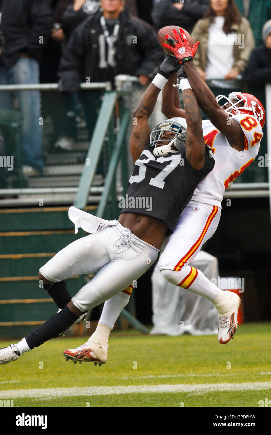 November 7, 2010; Oakland, CA, USA;  Oakland Raiders cornerback Chris Johnson (37) is called for pass interference on a reception attempt by Kansas City Chiefs wide receiver Chris Chambers (84)during the first quarter at Oakland-Alameda County Coliseum. Stock Photo