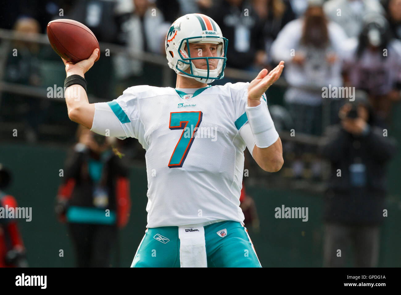 November 28, 2010; Oakland, CA, USA;  Miami Dolphins quarterback Chad Henne (7) throws a pass against the Oakland Raiders during the first quarter at Oakland-Alameda County Coliseum. Stock Photo