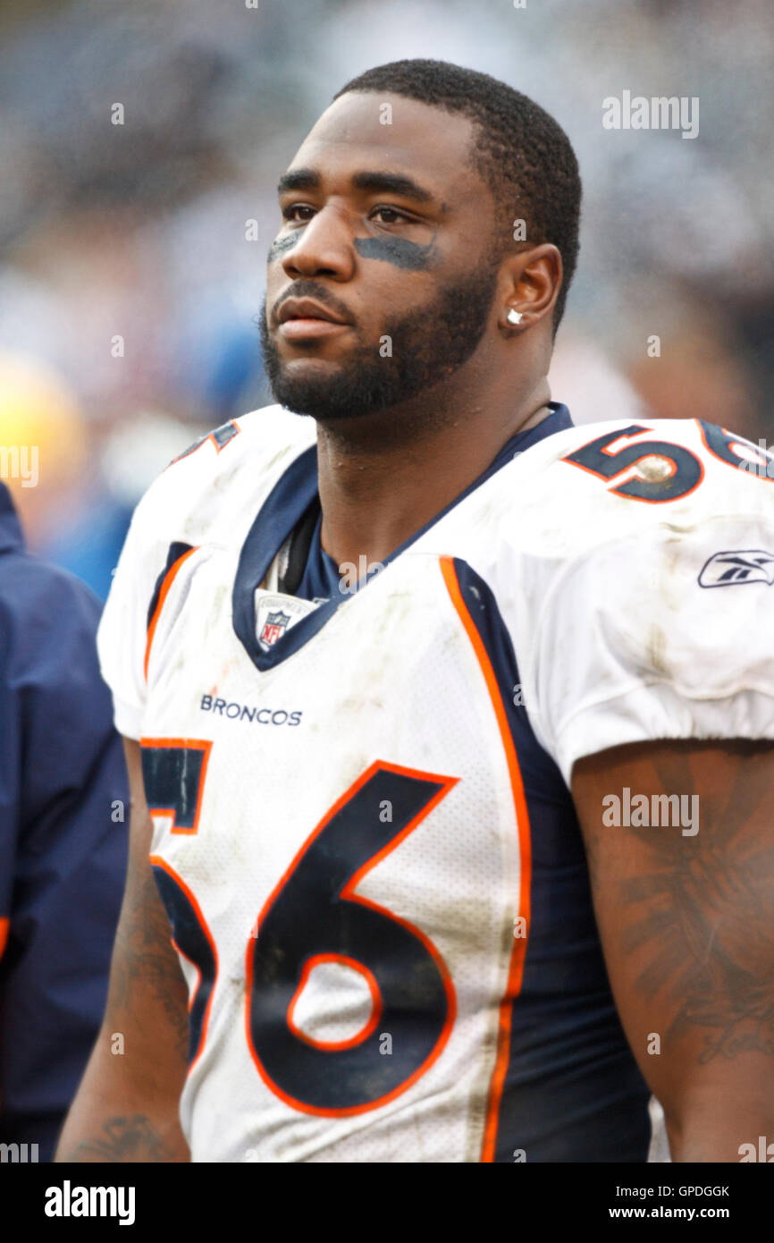December 19, 2010; Oakland, CA, USA;  Denver Broncos linebacker Robert Ayers (56) on the sidelines against the Oakland Raiders during the third quarter at Oakland-Alameda County Coliseum. Oakland defeated Denver 39-23. Stock Photo