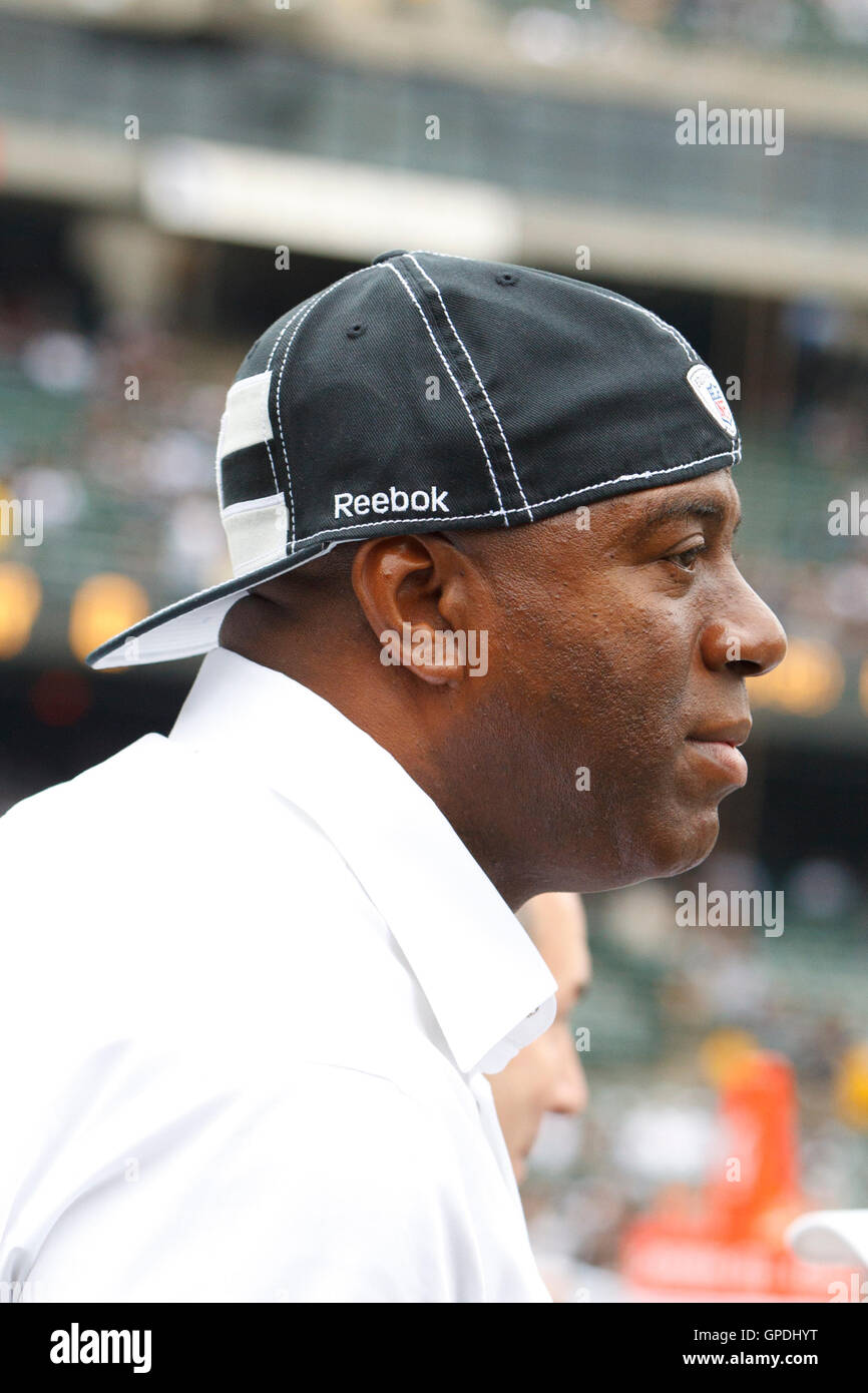 Sep 25, 2011; Oakland, CA, USA;  Los Angeles Lakers former player Magic Johnson on the sidelines before the game between the Oakland Raiders and the New York Jets at O.co Coliseum. Oakland defeated New York 34-24. Stock Photo