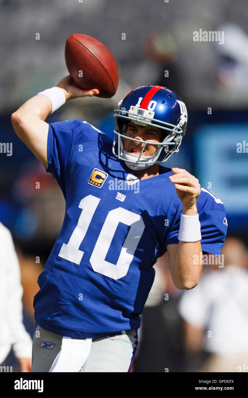 Oct 16, 2011; East Rutherford, NJ, USA; New York Giants quarterback Eli Manning (10) warms up before the game against the Buffalo Bills at MetLife Stadium. Stock Photo