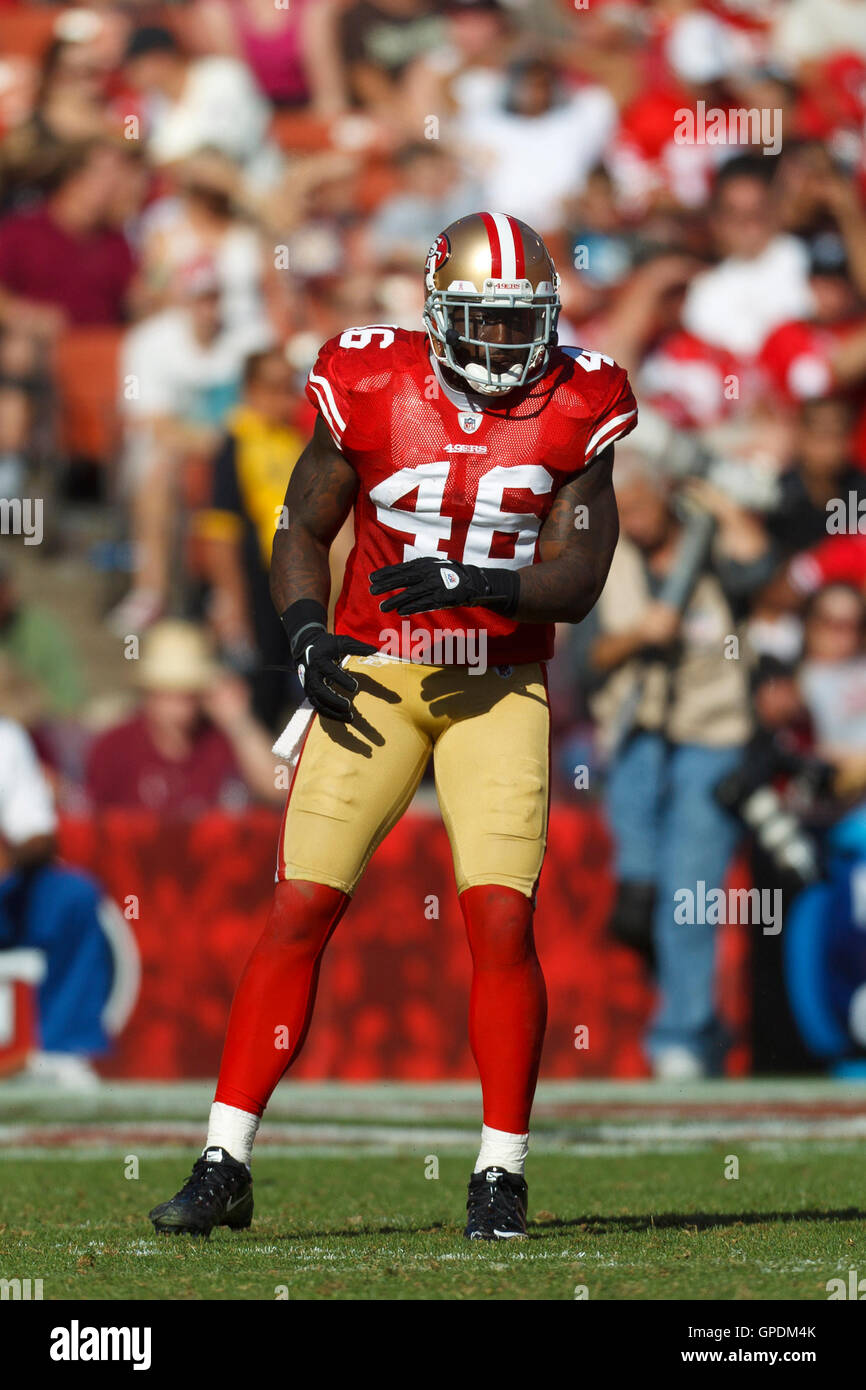 Dec 27, 2009; San Francisco, CA, USA; San Francisco 49ers tight end Delanie  Walker (46) breaks a tackle from Detroit Lions safety Louis Delmas (26)  during the second quarter at Candlestick Park.