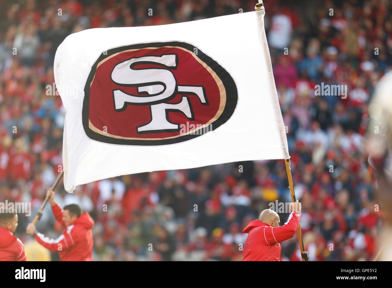 Nov 20, 2011; San Francisco, CA, USA; A San Francisco 49ers flag is waved on the field after a touchdown was scored against the Arizona Cardinals during the third quarter at Candlestick Park. Stock Photo
