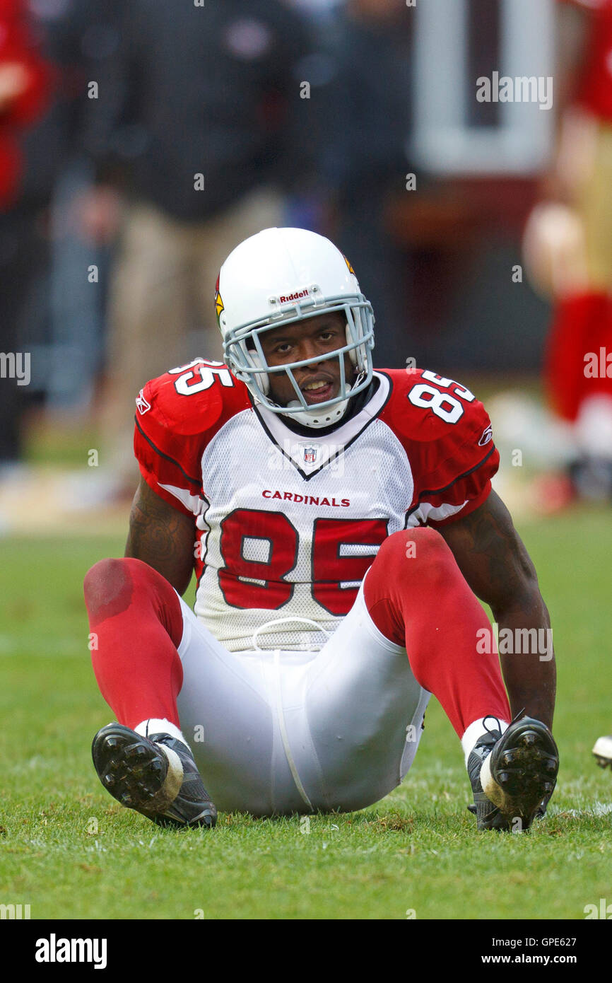 Nov 20, 2011; San Francisco, CA, USA; Arizona Cardinals wide receiver Early Doucet (85) is knocked to the ground during a play against the San Francisco 49ers during the fourth quarter at Candlestick Park. San Francisco defeated Arizona 23-7. Stock Photo