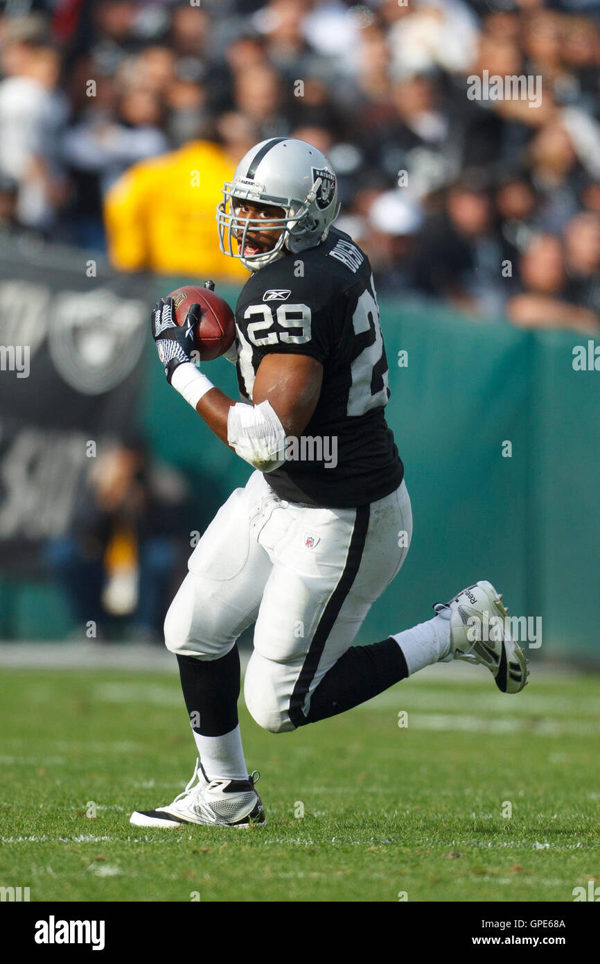 Nov 27, 2011; Oakland, CA, USA; Oakland Raiders running back Michael Bush (29) catches a pass against the Chicago Bears during the second quarter at O.co Coliseum. Stock Photo