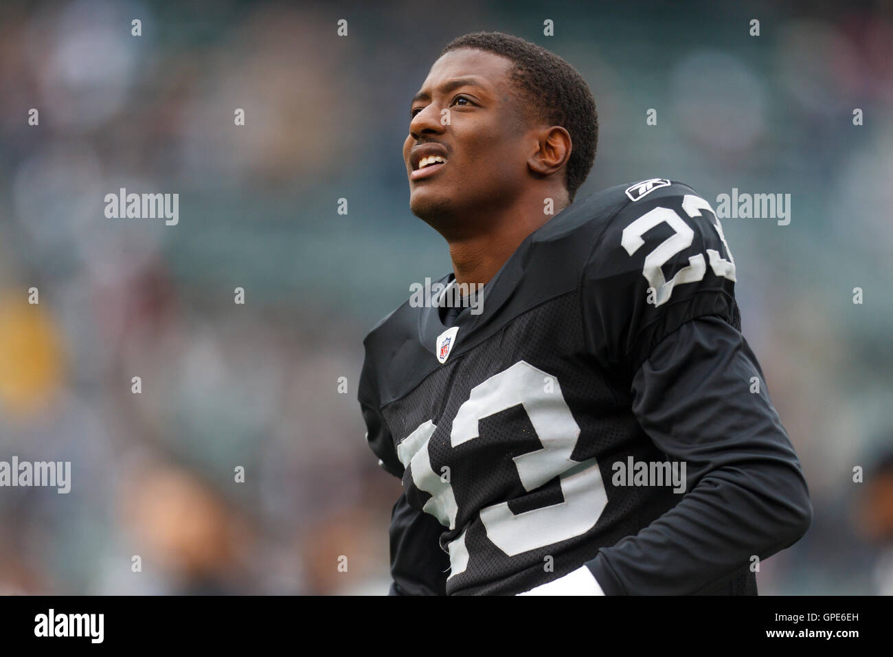Dec 18, 2011; Oakland, CA, USA; Oakland Raiders cornerback DeMarcus Van Dyke (23) warms up before the game against the Detroit Lions at O.co Coliseum. Detroit defeated Oakland 28-27. Stock Photo