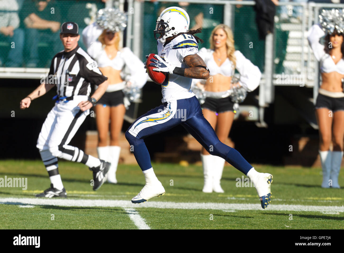 Jan 1, 2012; Oakland, CA, USA; San Diego Chargers wide receiver Richard Goodman (15) returns a kick off for a touchdown against the Oakland Raiders during the second quarter at O.co Coliseum. Stock Photo