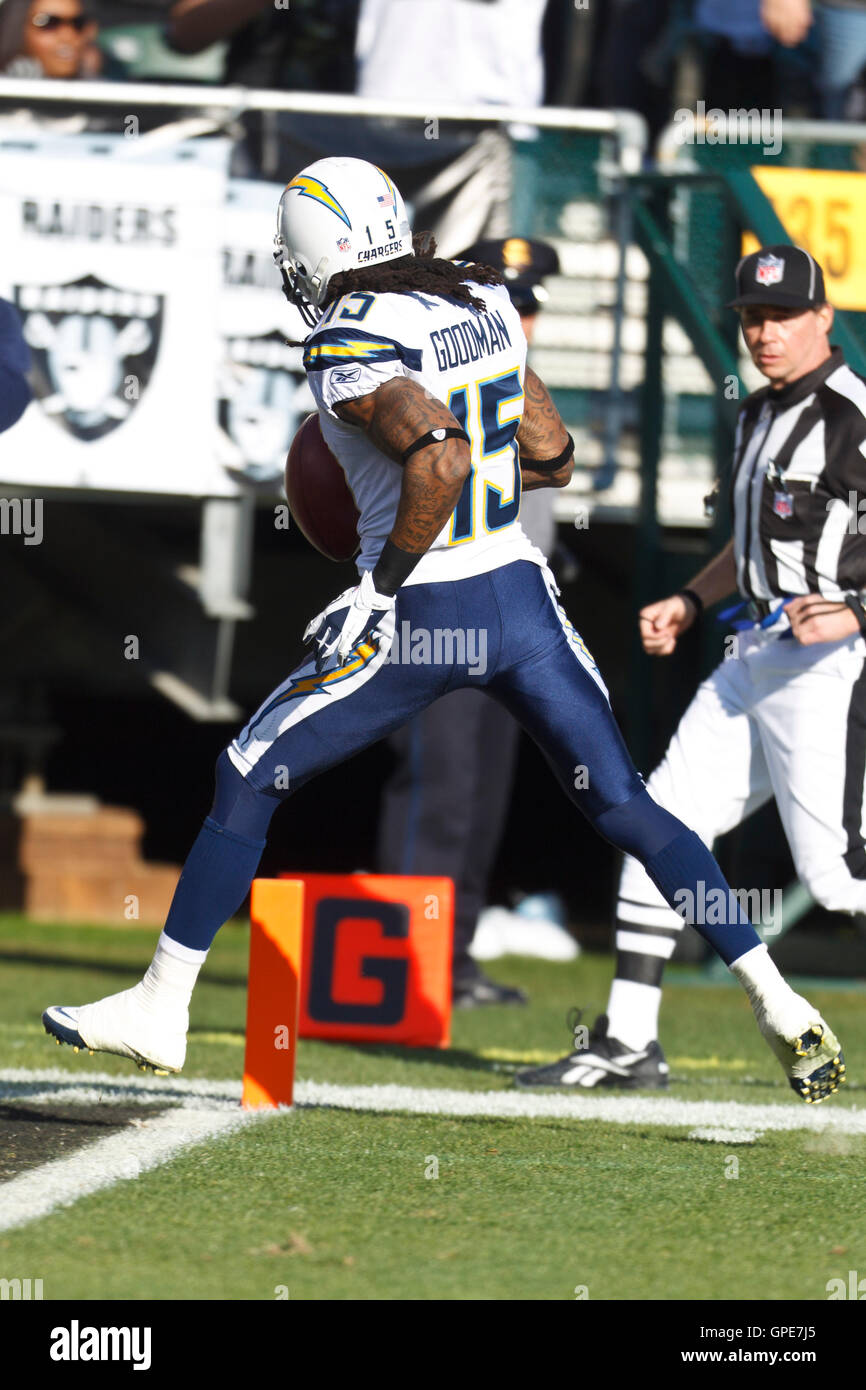 Jan 1, 2012; Oakland, CA, USA; San Diego Chargers wide receiver Richard Goodman (15) returns a kick off for a touchdown against the Oakland Raiders during the second quarter at O.co Coliseum. Stock Photo