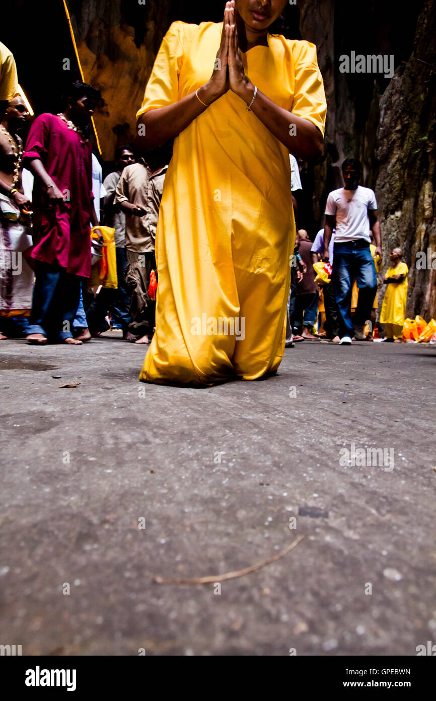 Man prays on his knees hi-res stock photography and images - Alamy