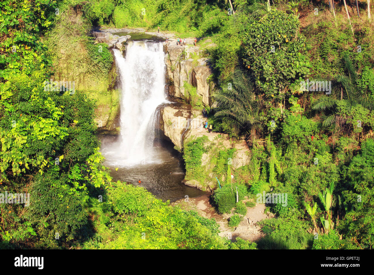 UBUD/INDONESIA - CIRCA NOVEMBER 2016: Amazing Tegenungan waterfall surrounded by green forest in Bali Stock Photo