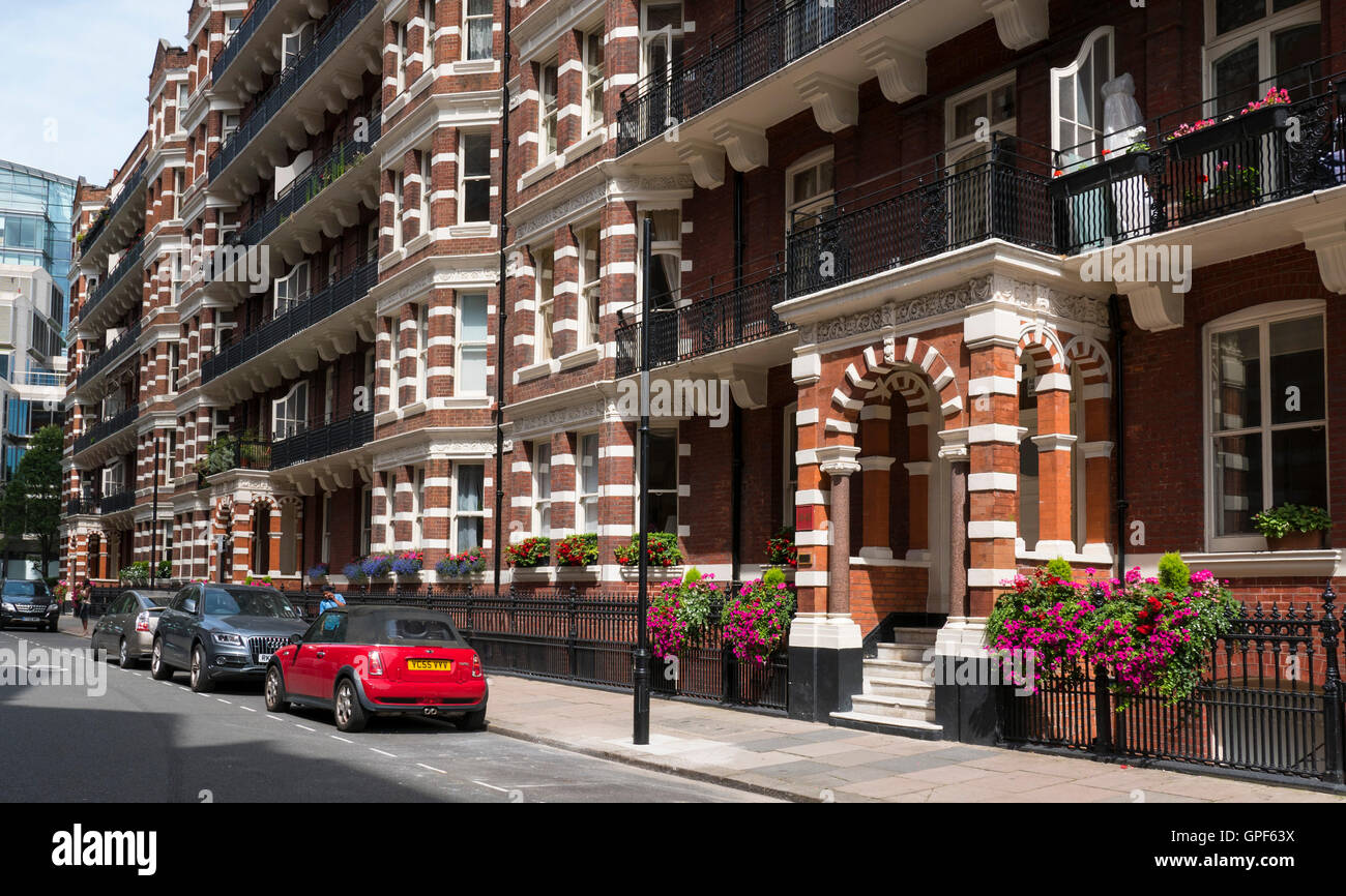 Mansion Block Red Brick Building  in VIctoria London SW1 Stock Photo