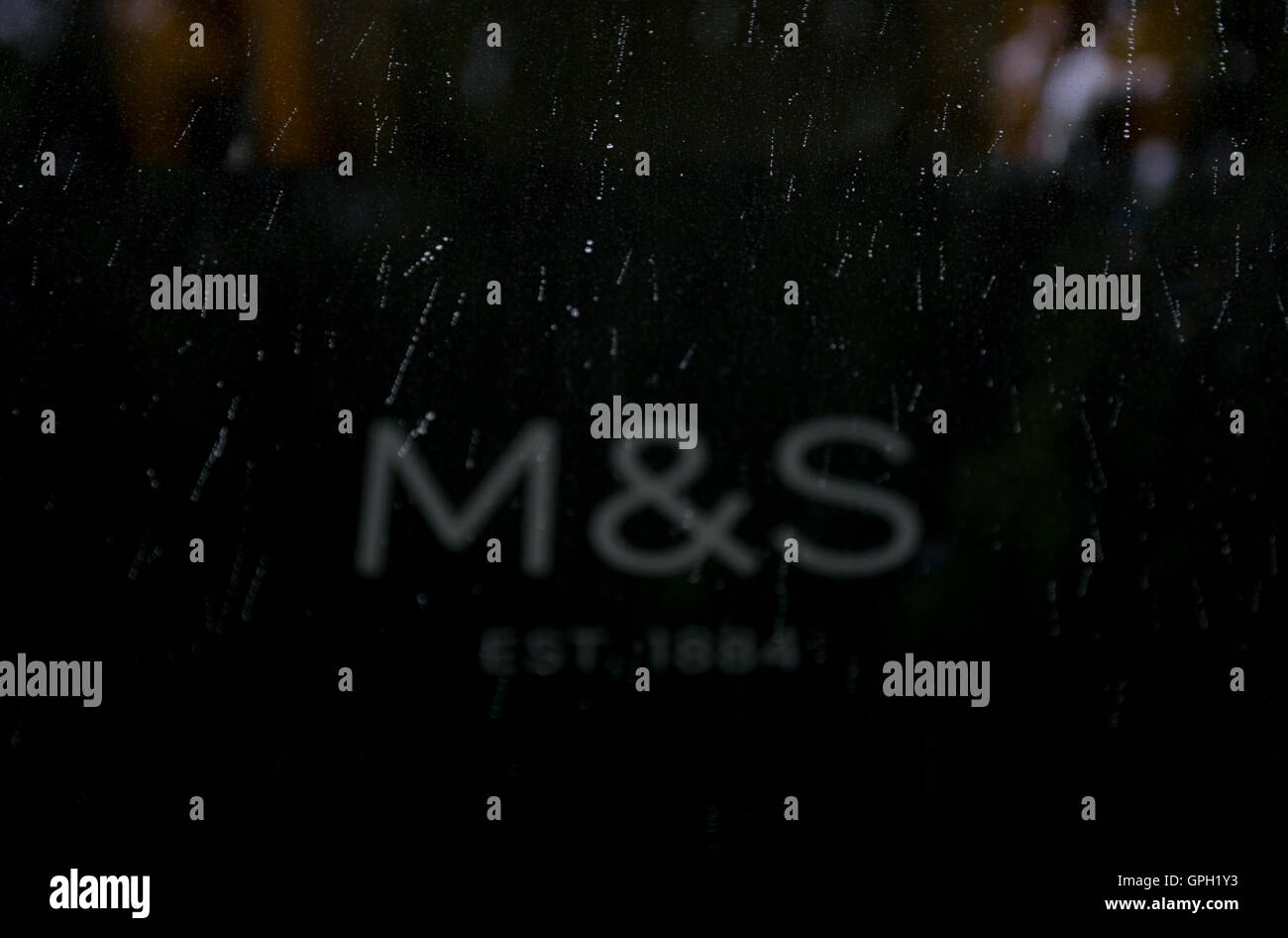 A general view of raindrops falling in front of signage at the head