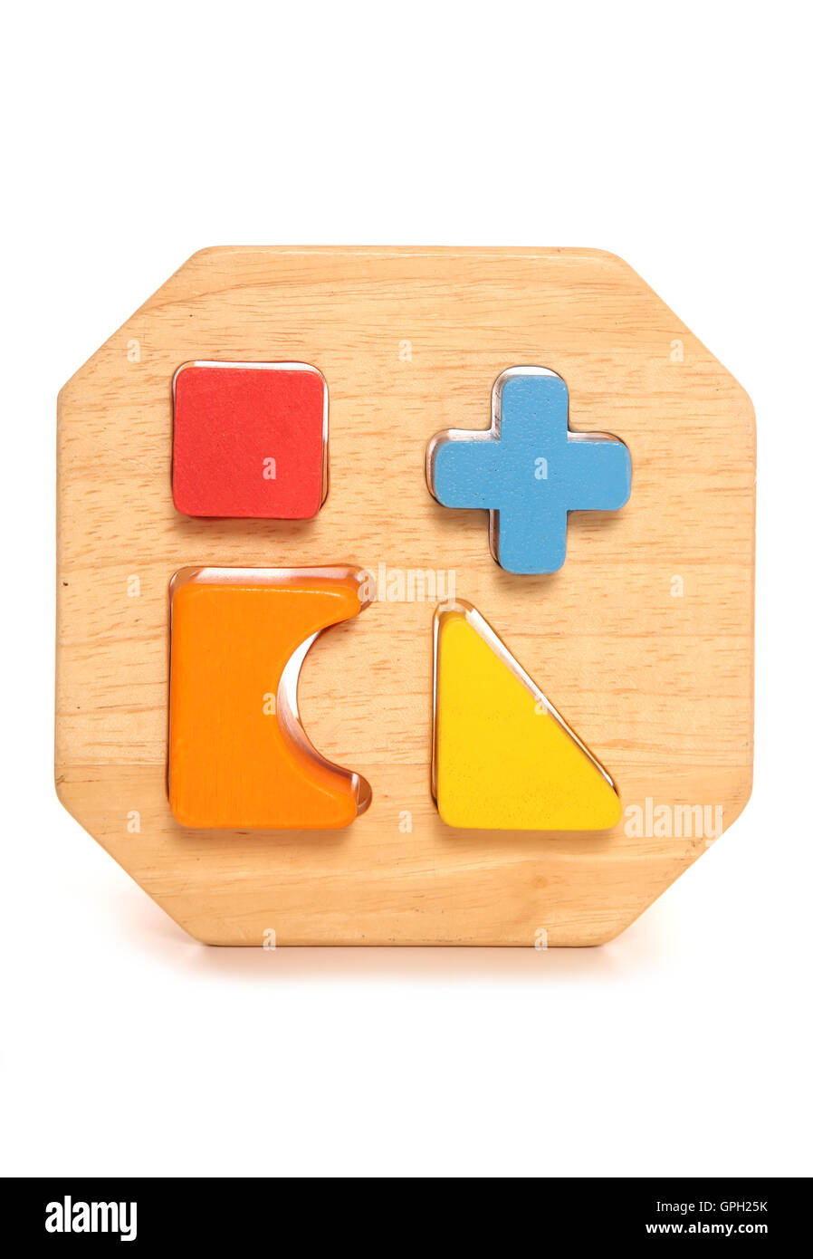 Wooden childs shape sorter toy cutout Stock Photo