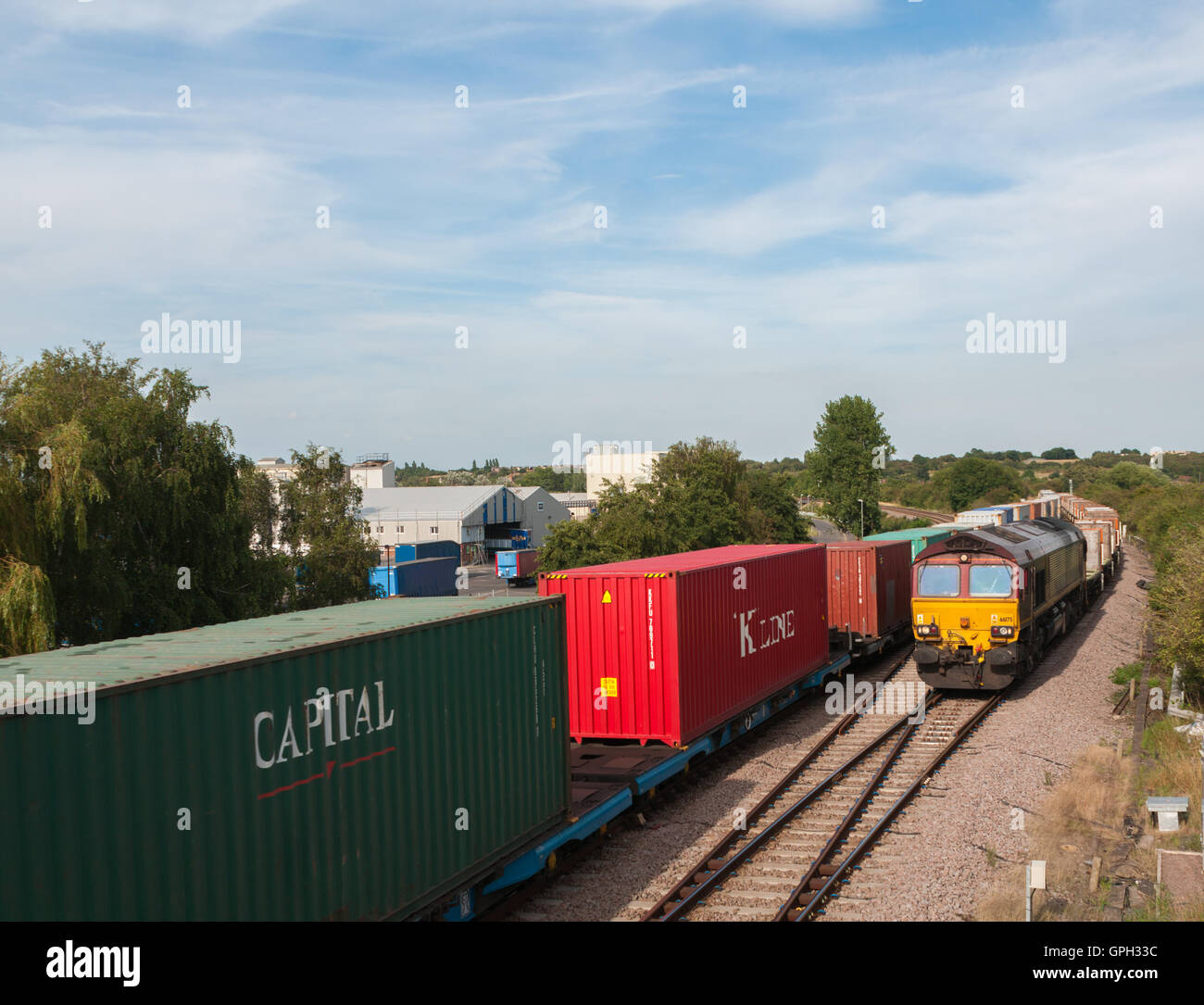 UK Rail freight trains passing containers Stock Photo Alamy