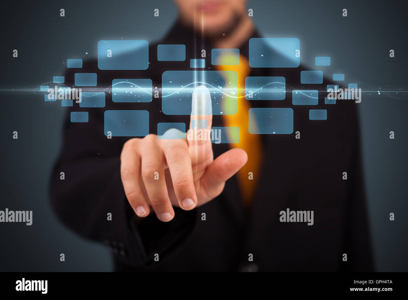 Businessman pressing high tech type of modern buttons Stock Photo - Alamy