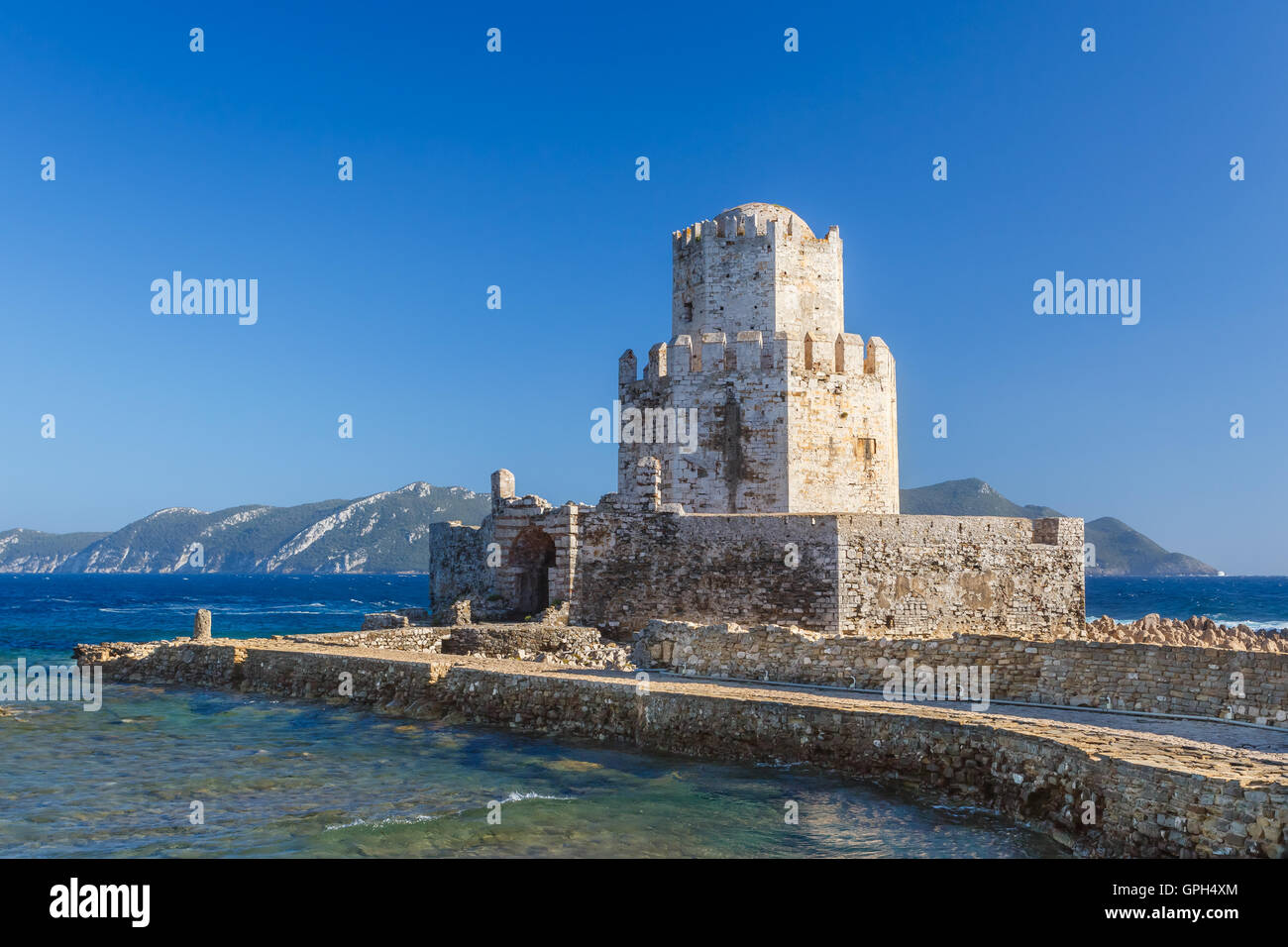 The Bourtzi tower in Methoni Venetian Fortress against a blue sky in the Peloponnese, Messinia, Greece Stock Photo
