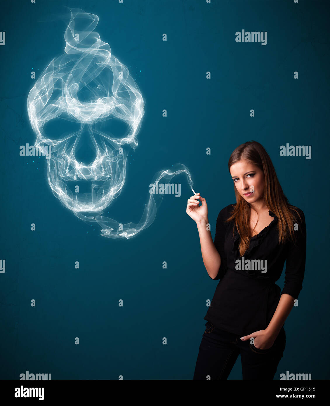 Young woman smoking dangerous cigarette with toxic skull smoke Stock Photo Alamy