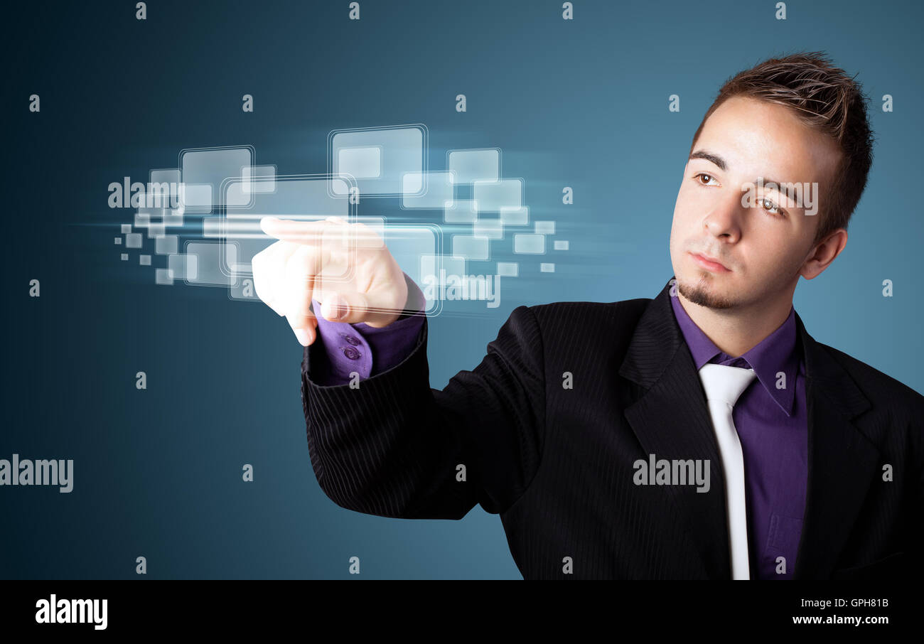 Businessman pressing high tech type of modern buttons Stock Photo - Alamy