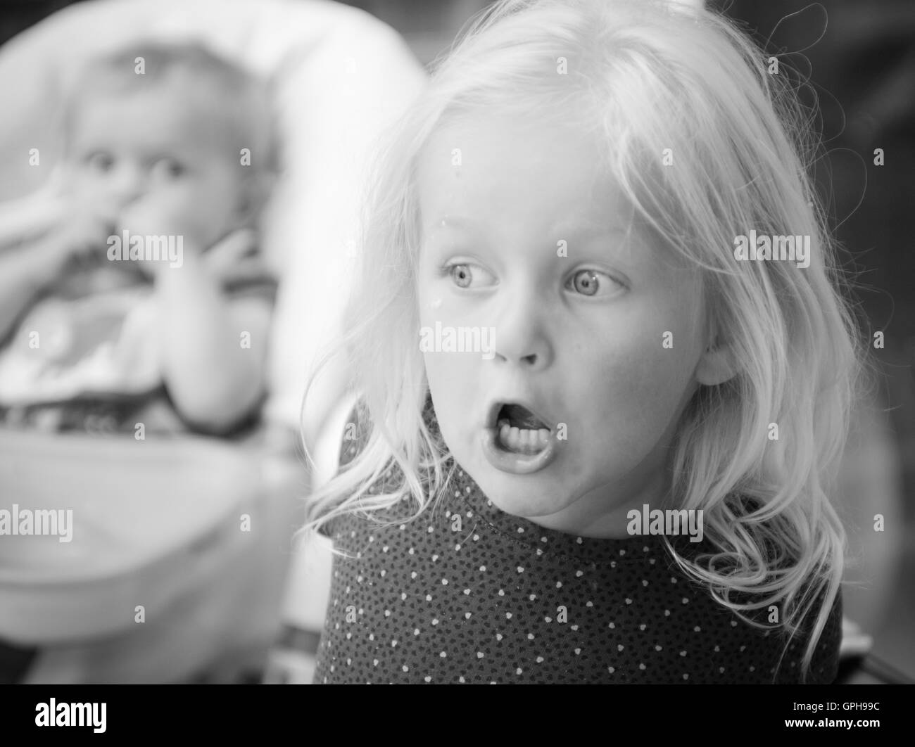 Two kids Black and White Stock Photos & Images - Alamy
