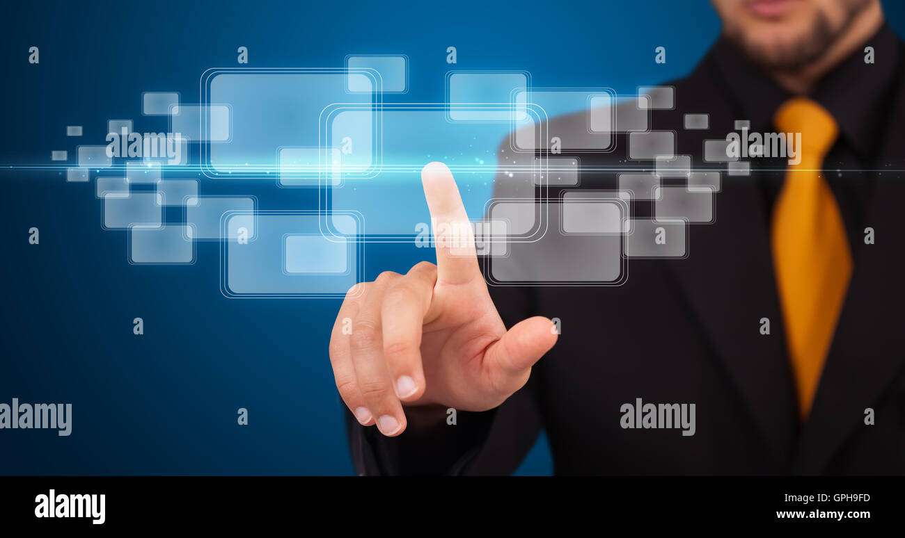 Businessman pressing high tech type of modern buttons Stock Photo - Alamy