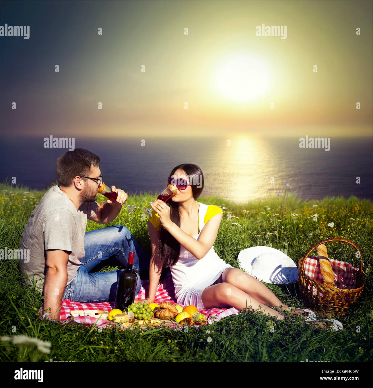 Young couple having picnic Stock Photo