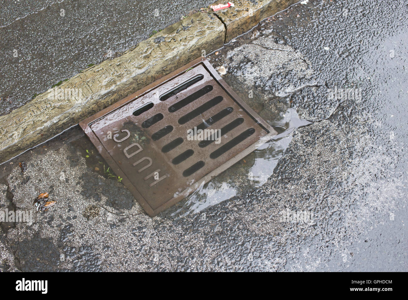 Drains blocked by leaves and mud and not cleaned out Stock Photo Alamy