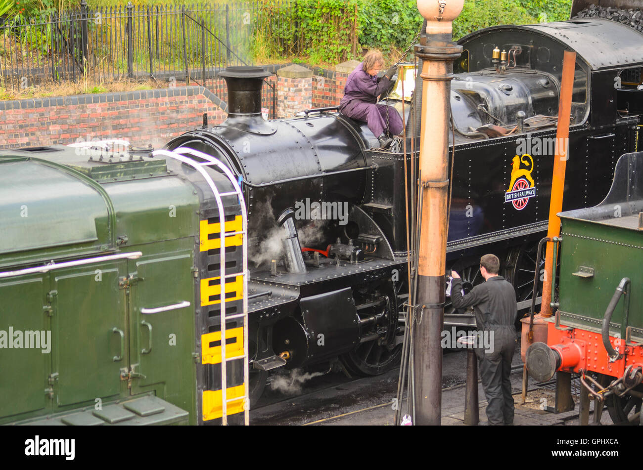 Steam train filling water hires stock photography and images Alamy