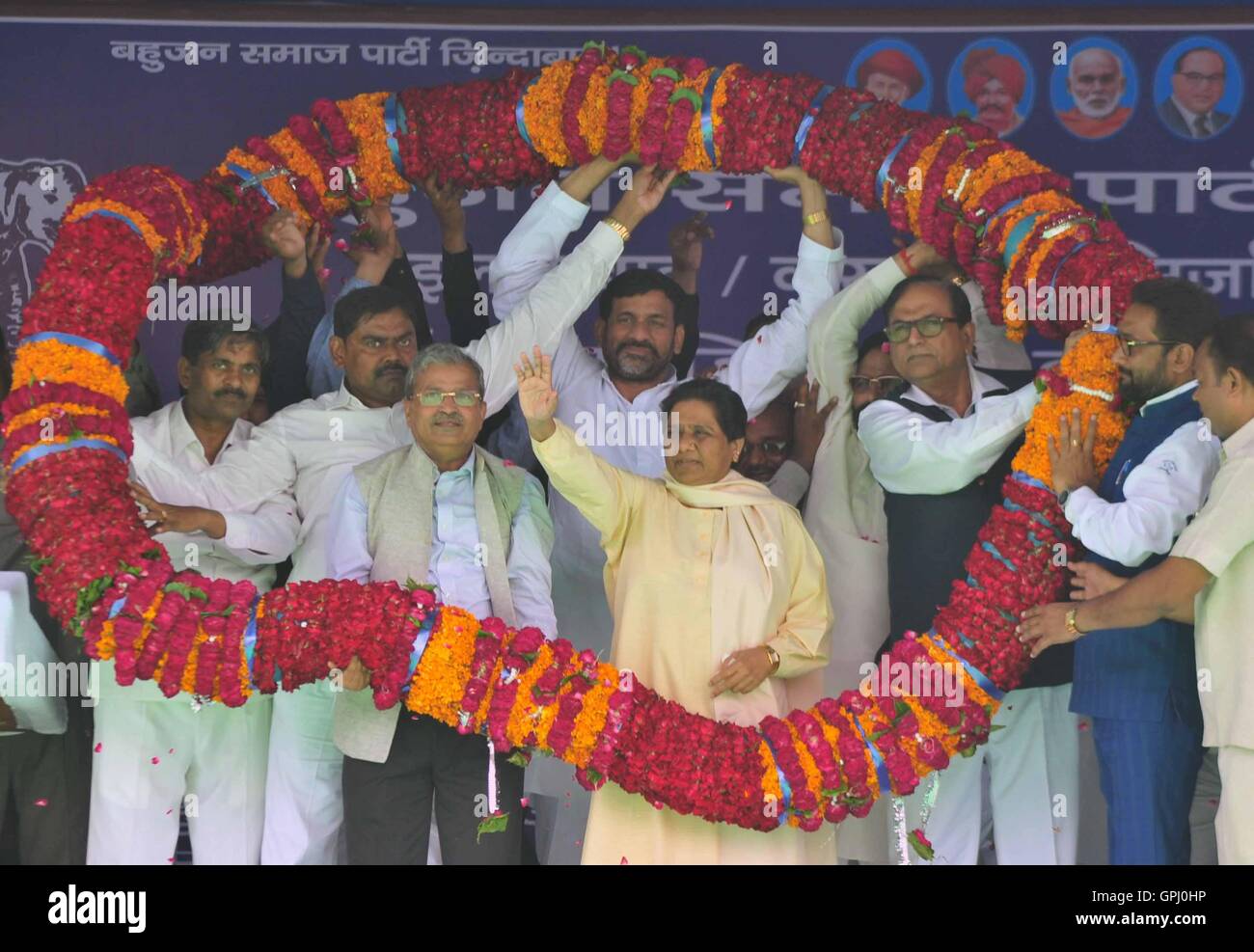 Allahabad, India. 04th Sep, 2016. BSP Worker offer garland to supremo Mayawati during an election campaign rally in the view of upcoming UP assembly election at Pared Ground in Allahabad. © Prabhat Kumar Verma/Pacific Press/Alamy Live News Stock Photo