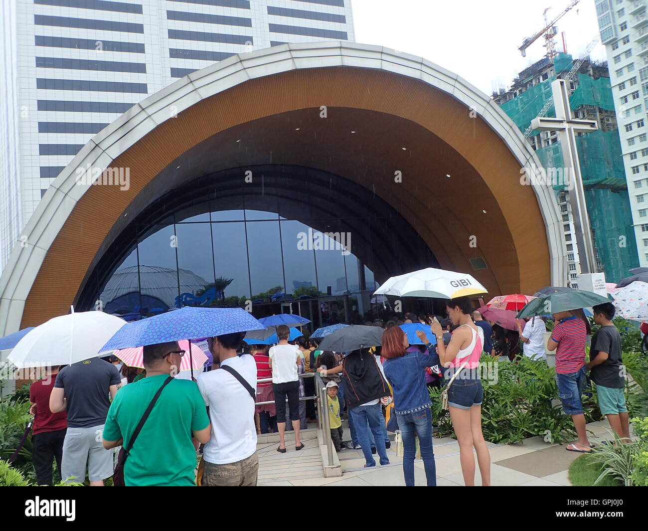 Chapel of San Pedro Calungsod in SM Aura, Taguig City opens its door for public veneration of the first class relic “ex capillis”( from the hair) and second class relic “ex indumentis”( from the clothing) of Blessed Mother Teresa of Kolkata (Calcutta) during her canonization day in Vatican on September 4, 2016. Hundreds of devotees in Taguig City flocked to the attend the holy mass in honor of the newly canonized saint even Metro Manila is experiencing wet weather. Mother Teresa visited the Philippines thrice. (Photo by Sherbien Dacalanio/Pacific Press) Stock Photo