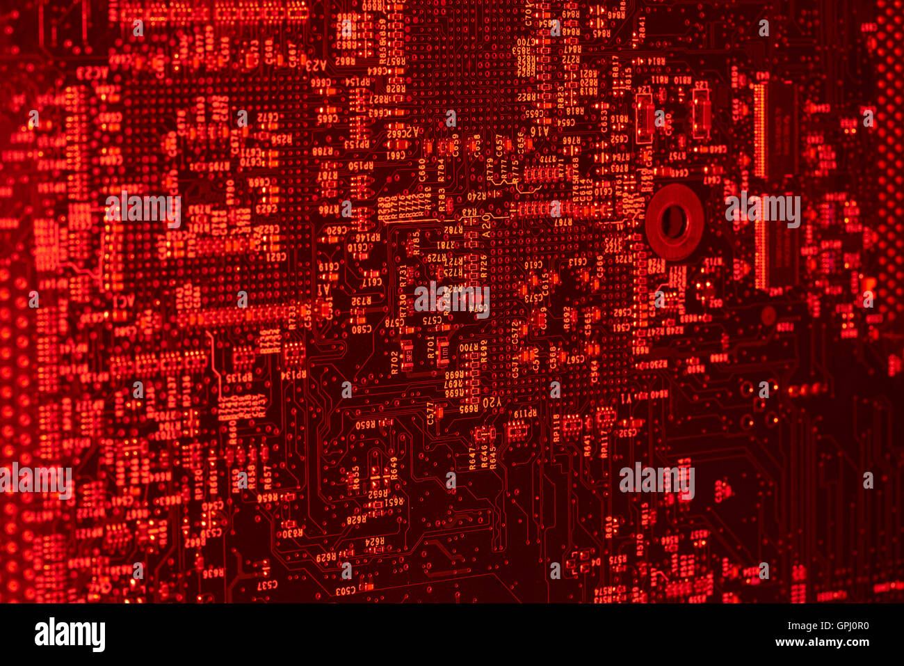 full frame red illuminated printed circuit board closeup Stock Photo ...