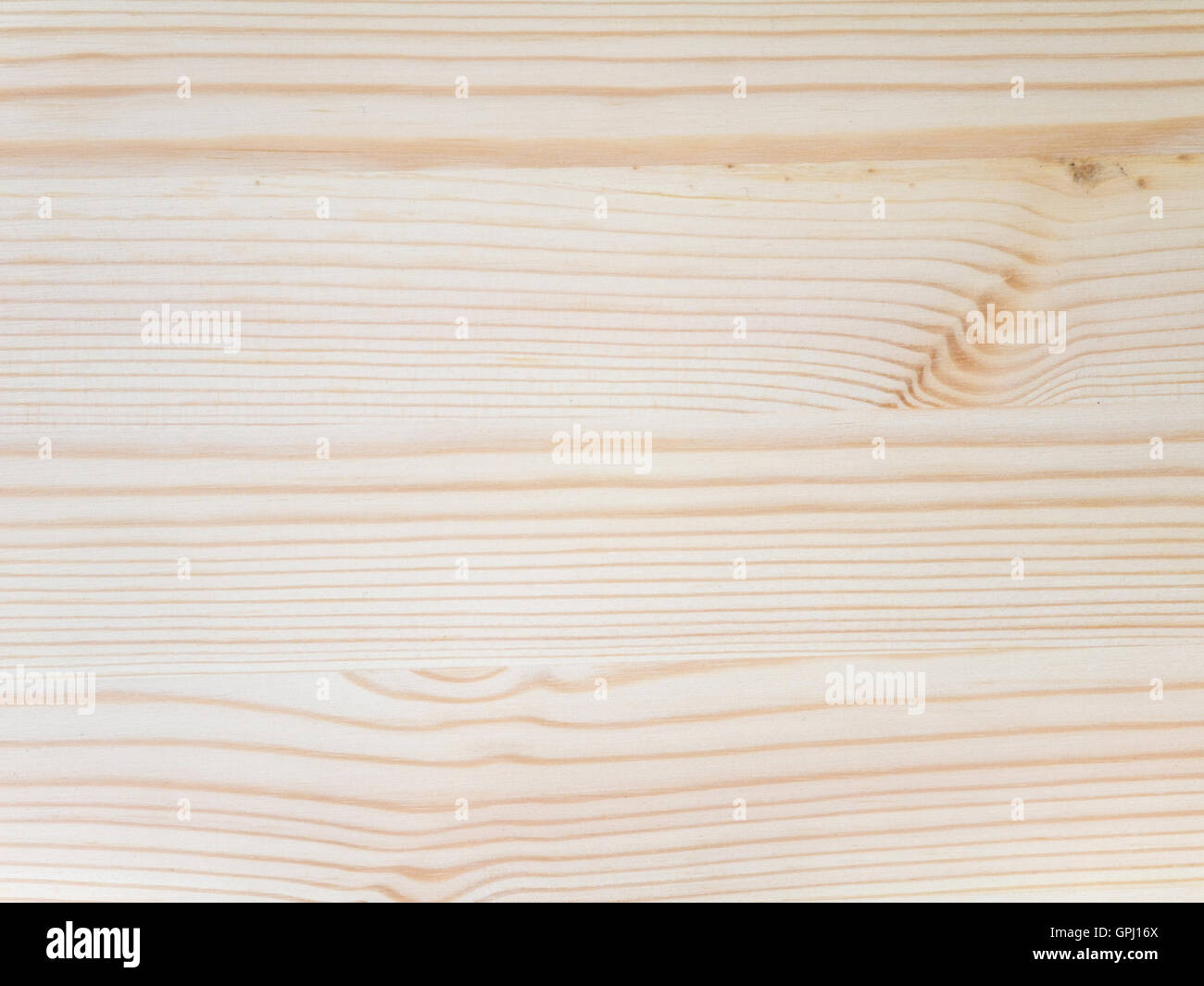 Natural light textured wooden wall with knots Stock Photo