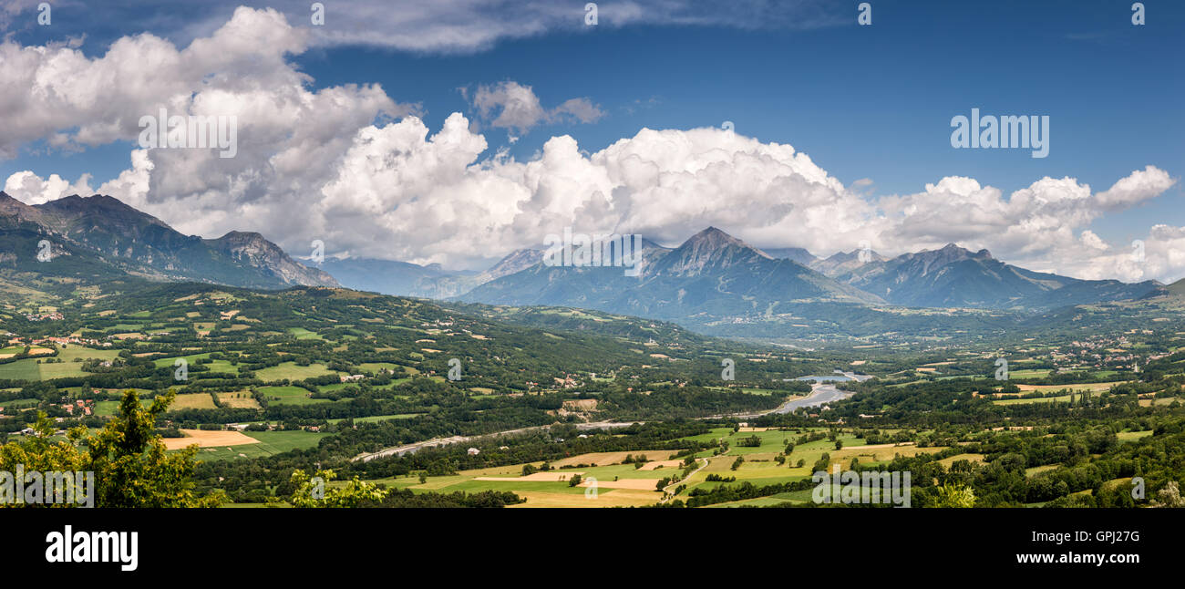 Champsaur Valley and Drac River with clouds. Hautes-Alpes (Southern French Alps) in summer. France Stock Photo