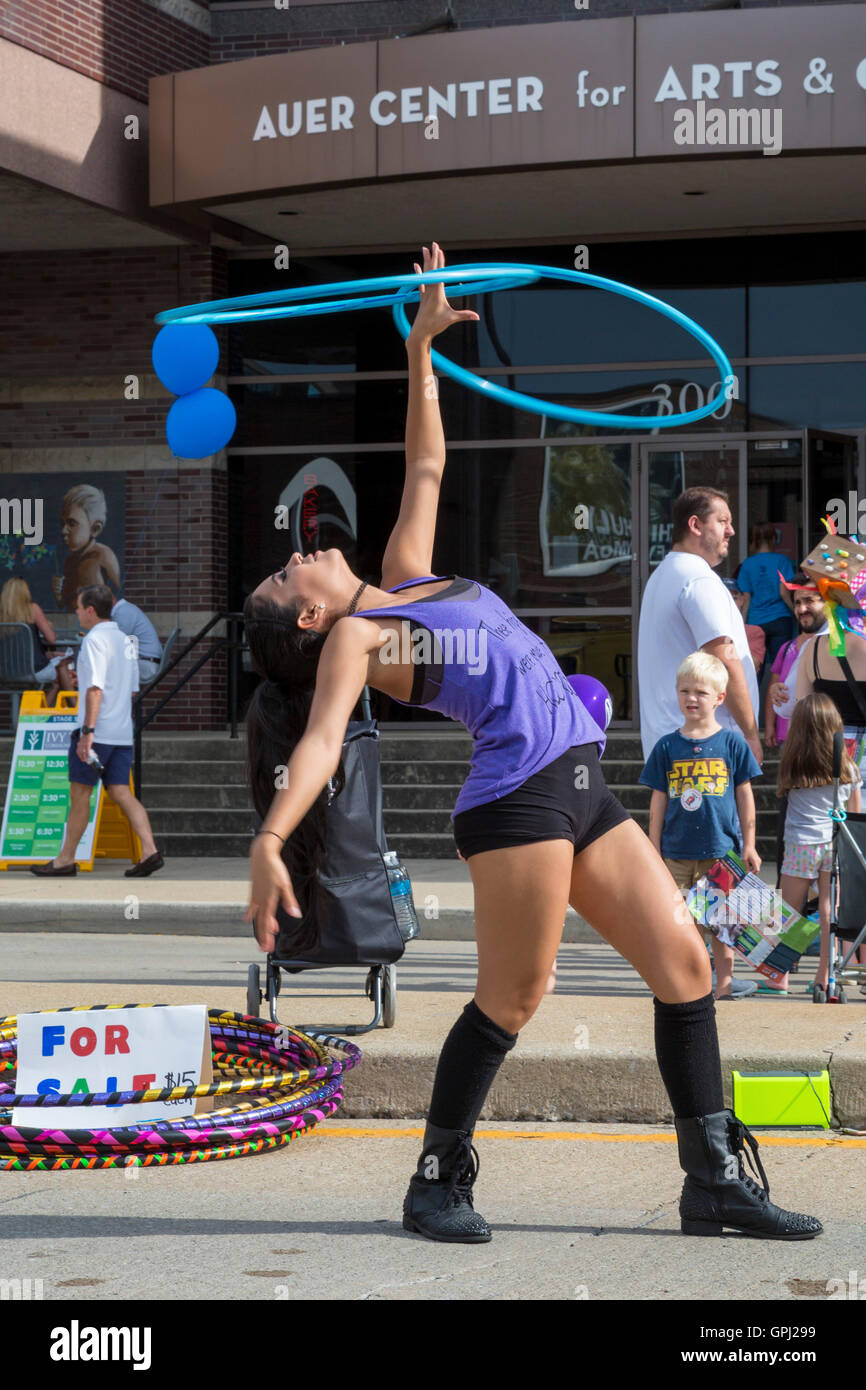 Fort Wayne, Indiana - An entertainer twirls hoops at the Fort Wayne Taste of the Arts Festival. Stock Photo