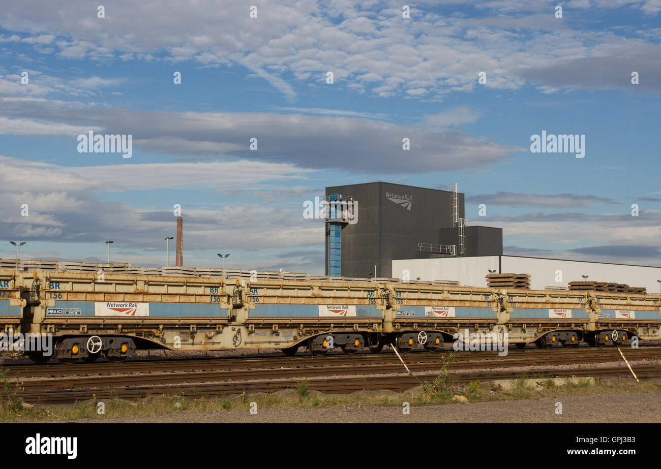A Network rail Infrastructure depot with freight trains ready to depart