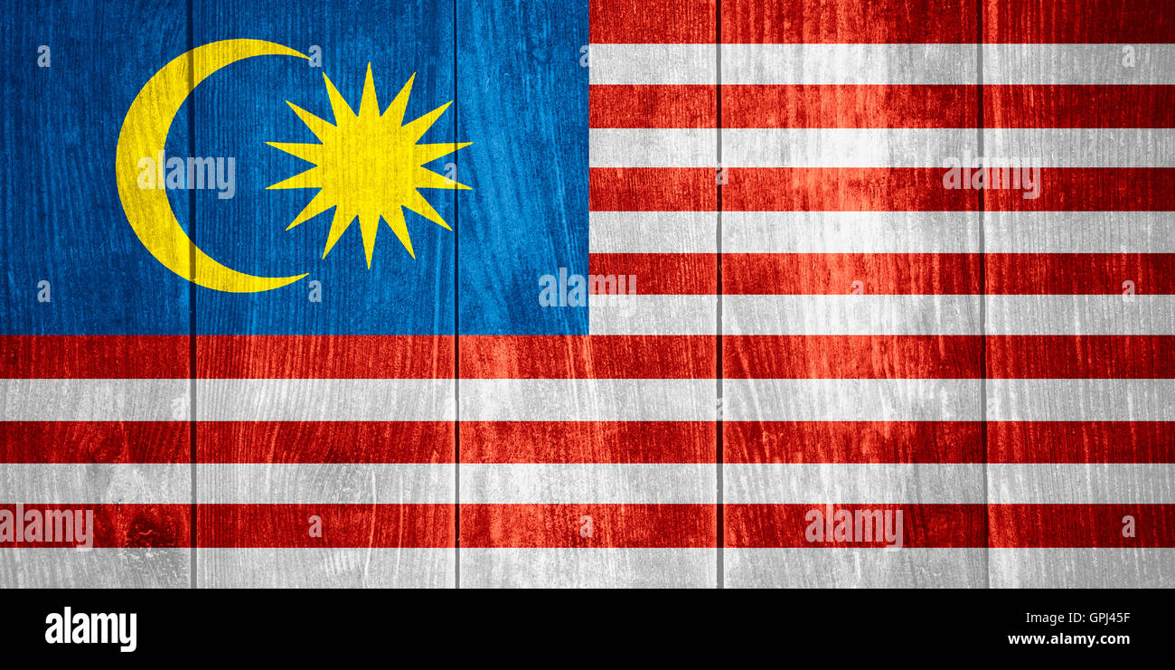 flag of Malaysia or Malaysian banner on wooden background Stock Photo