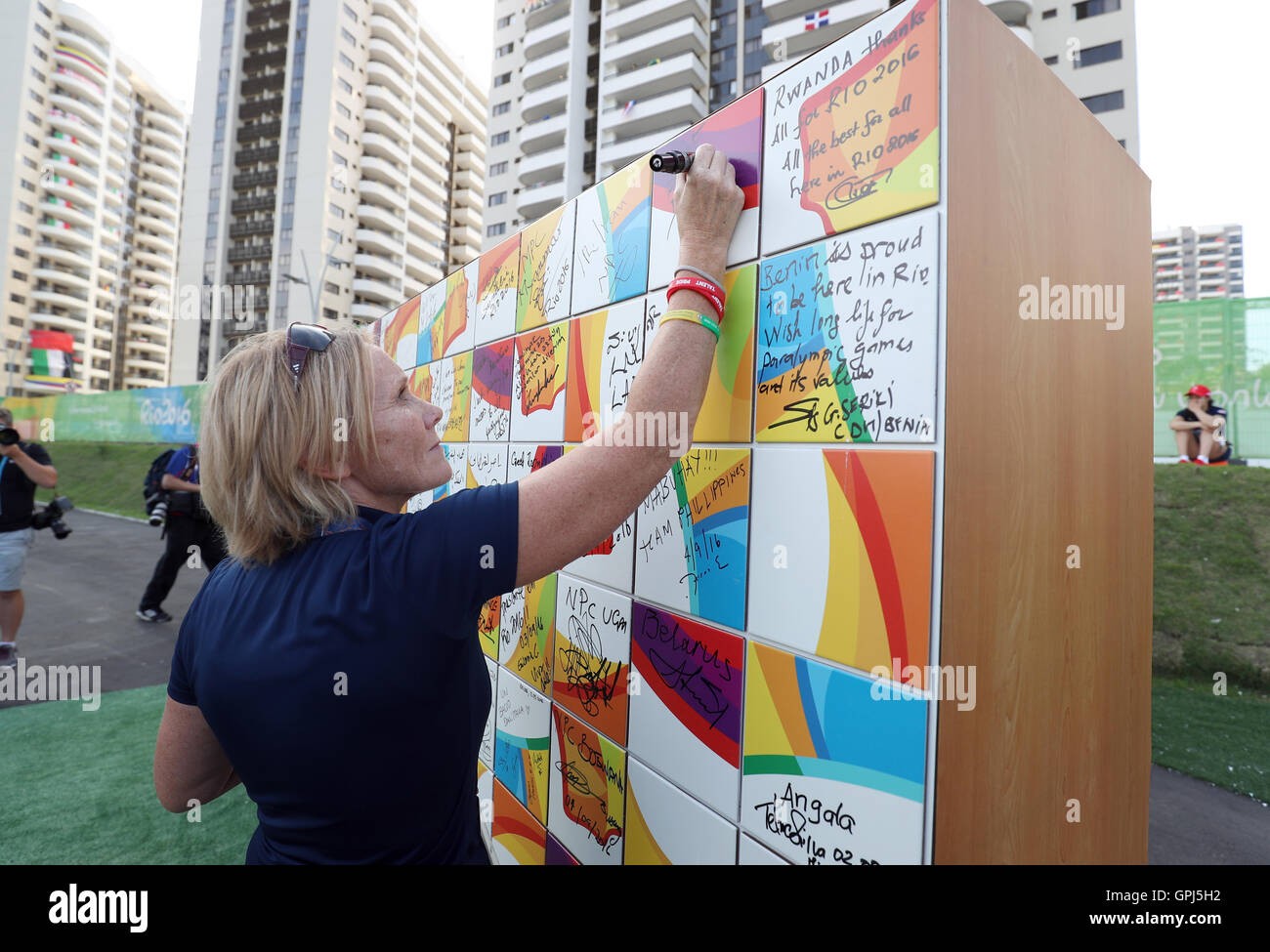 ParalympicsGB Chef de Mission Penny Briscoe writes a message on a wall during the Paralympics GB Welcome Ceremony at the Athletes Village ahead of the 2016 Rio Paralympic Games, Brazil. Stock Photo