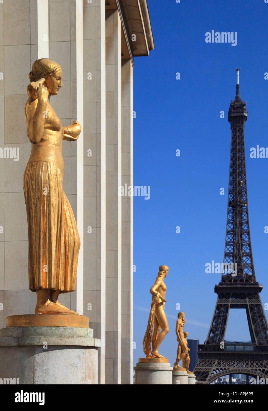 The Gold Statues of Palais de Chaillot with the Eiffel Tower in the background, Trocadero, Paris, France, Europe Stock Photo