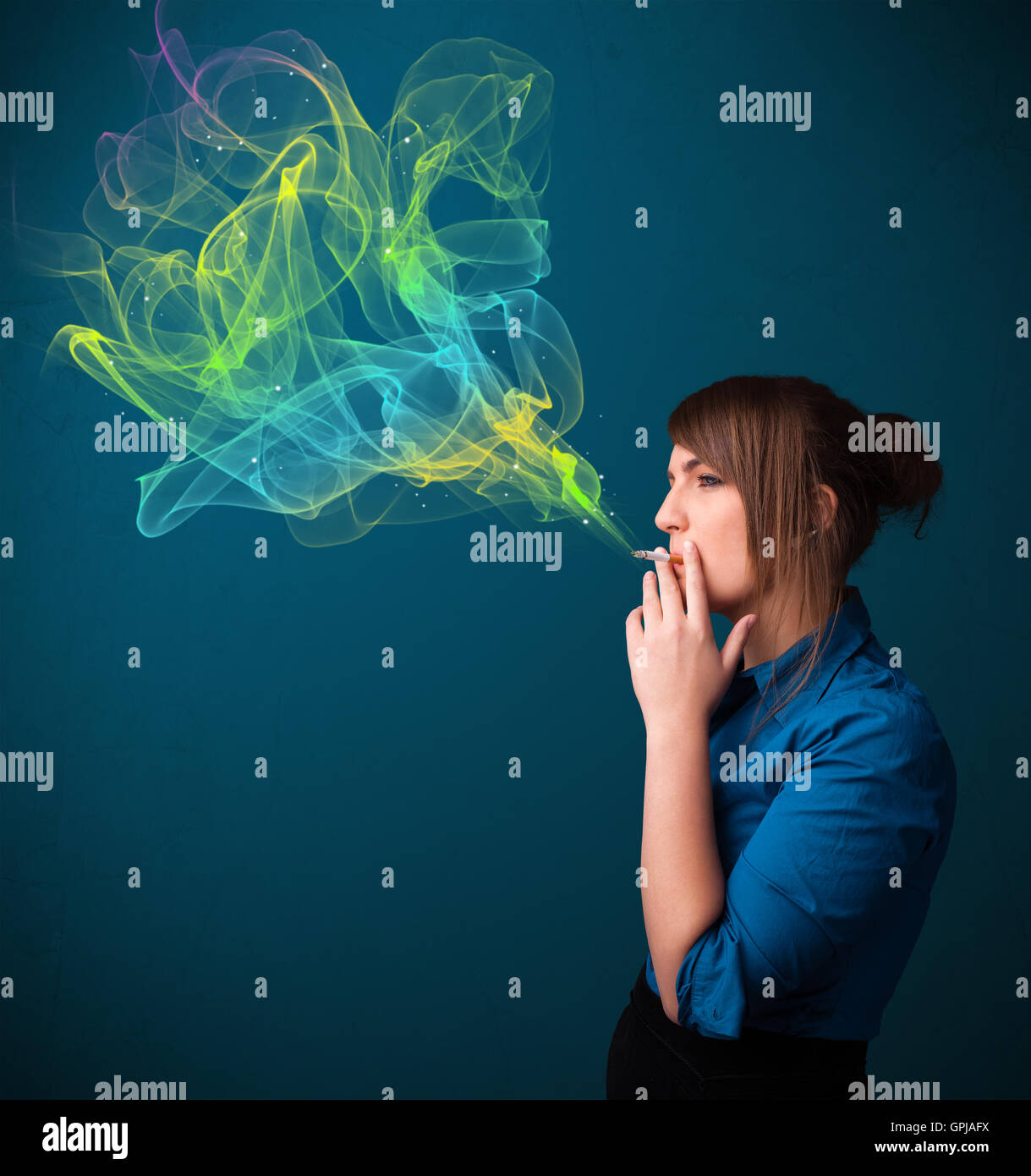 Pretty lady smoking cigarette with colorful smoke Stock Photo - Alamy