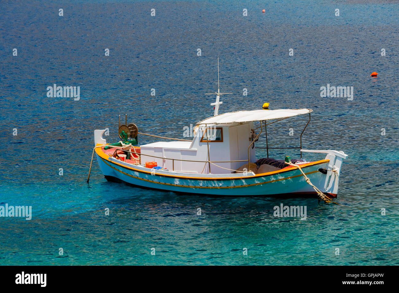 Small boat on large sea hi-res stock photography and images - Alamy