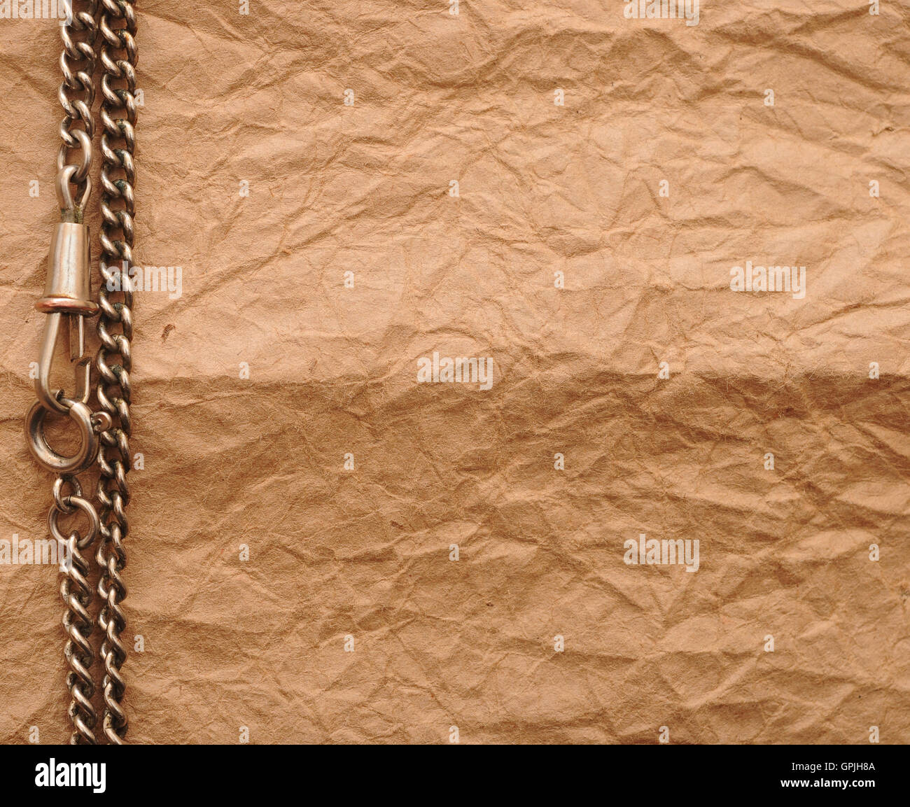 old paper and silver chain with copy space Stock Photo - Alamy
