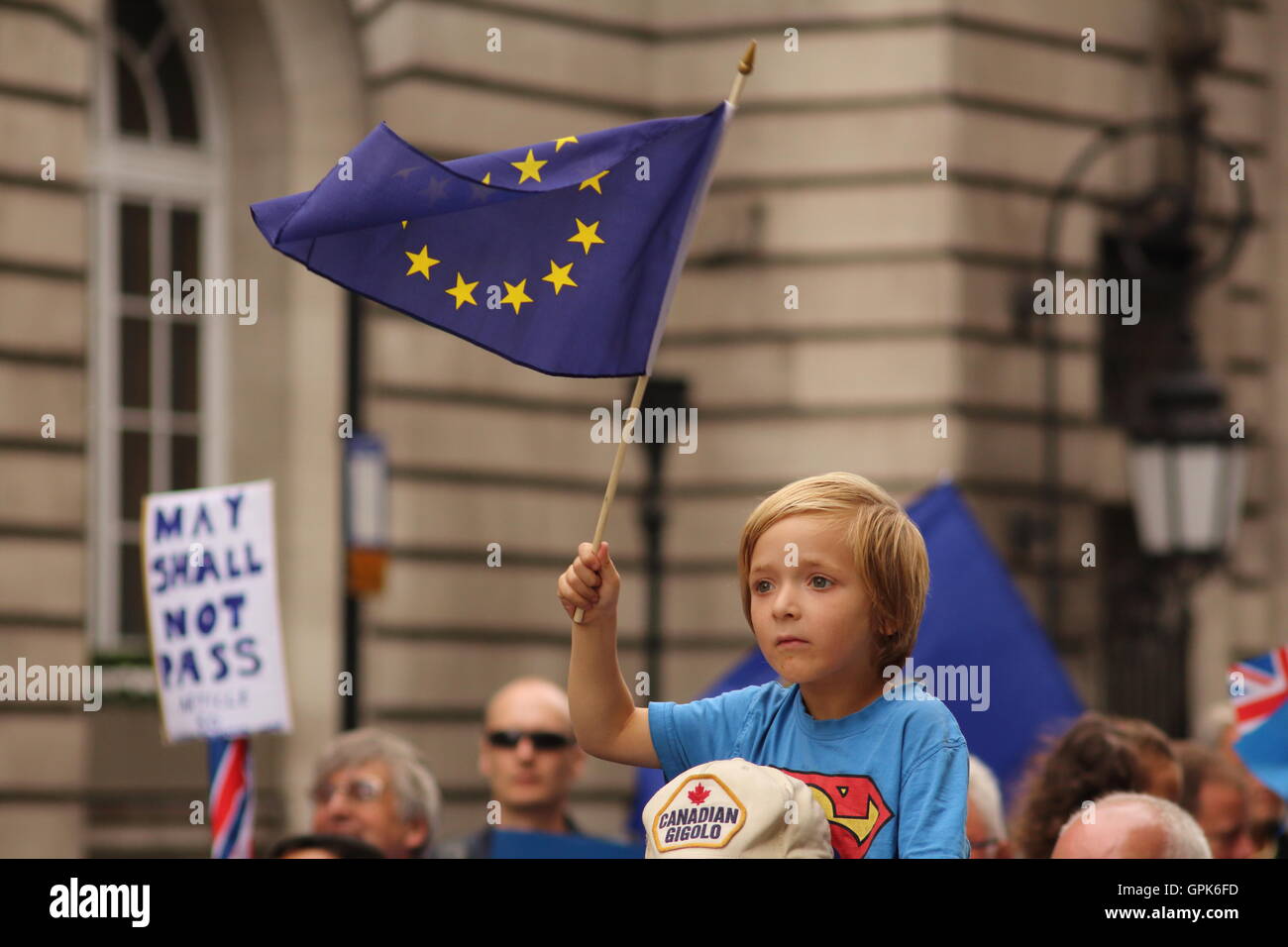 London, UK  3rd September 2016  Young boy waving EU flag on dad's shoulders Protesting at the September 2016 'March for Europe'  Credit: Will Saunders/Alamy Live News Stock Photo